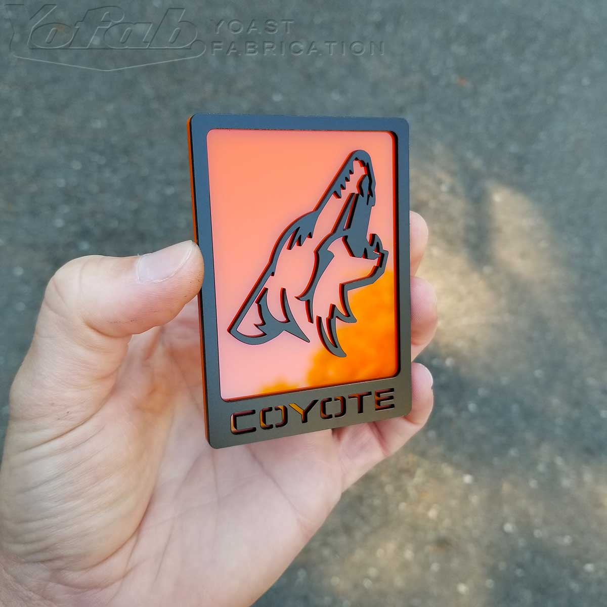 Orange Howling Coyote Badge