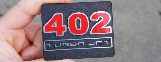 402 Turbo Jet Interior Badge