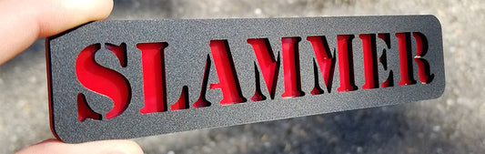 Embossed Matte Black & Red Slammer Emblem