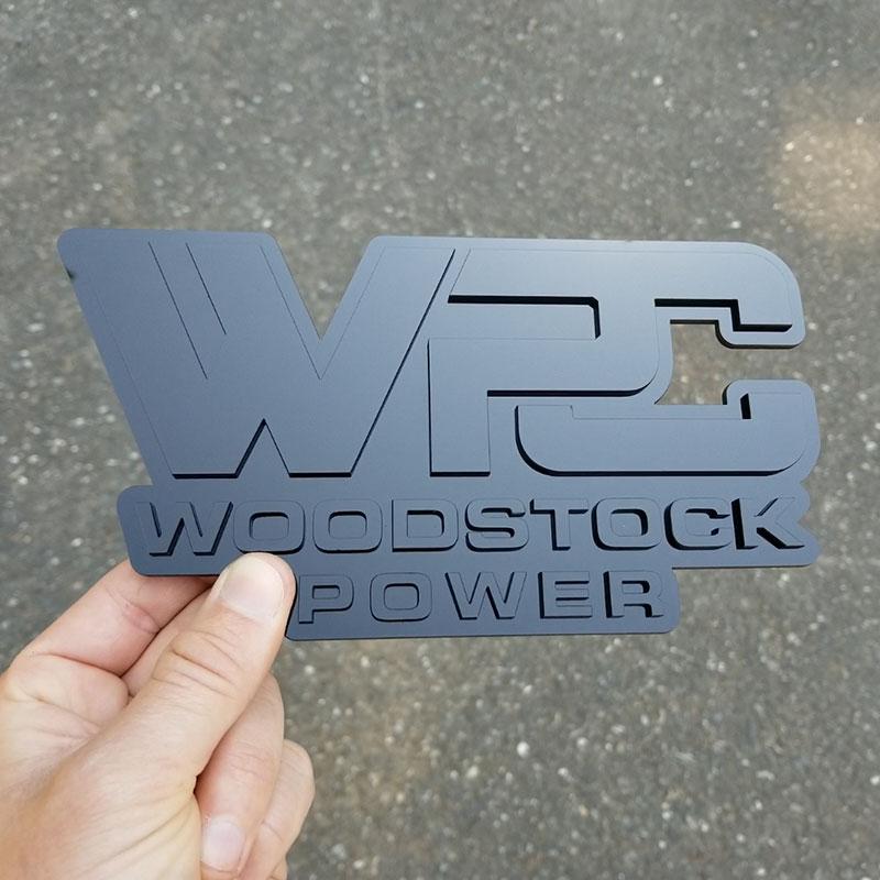 Woodstock Power gloss black on black emblem