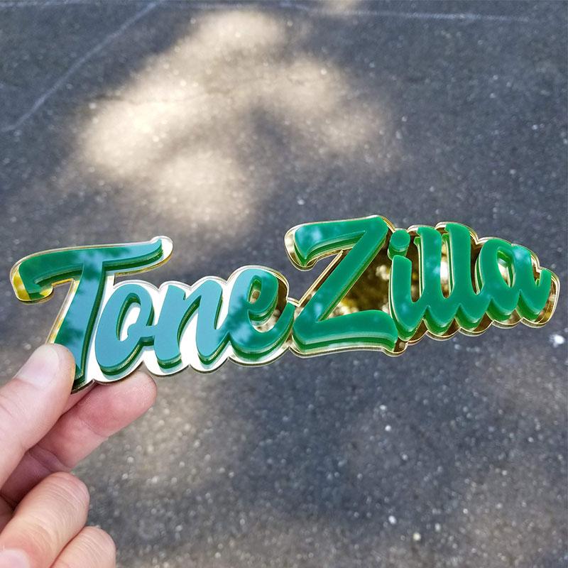 Tone-Zilla emblem