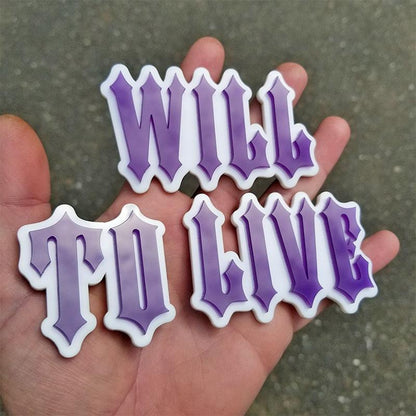 Will to Live badge, purple and white