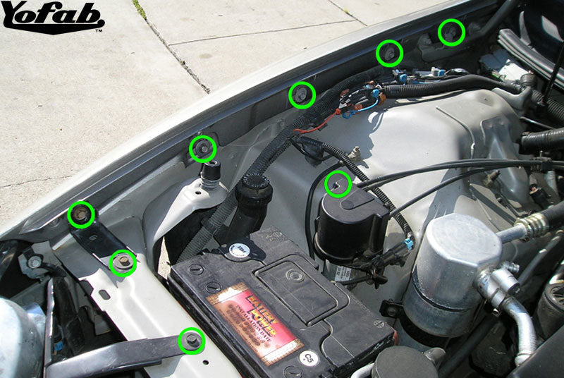 The green circles in the pictures below represent the stock bolts that get replaced on the Camaro